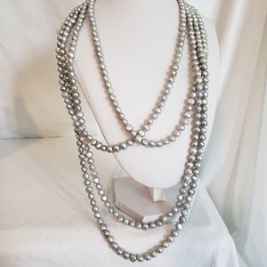 Extra long pearl necklace